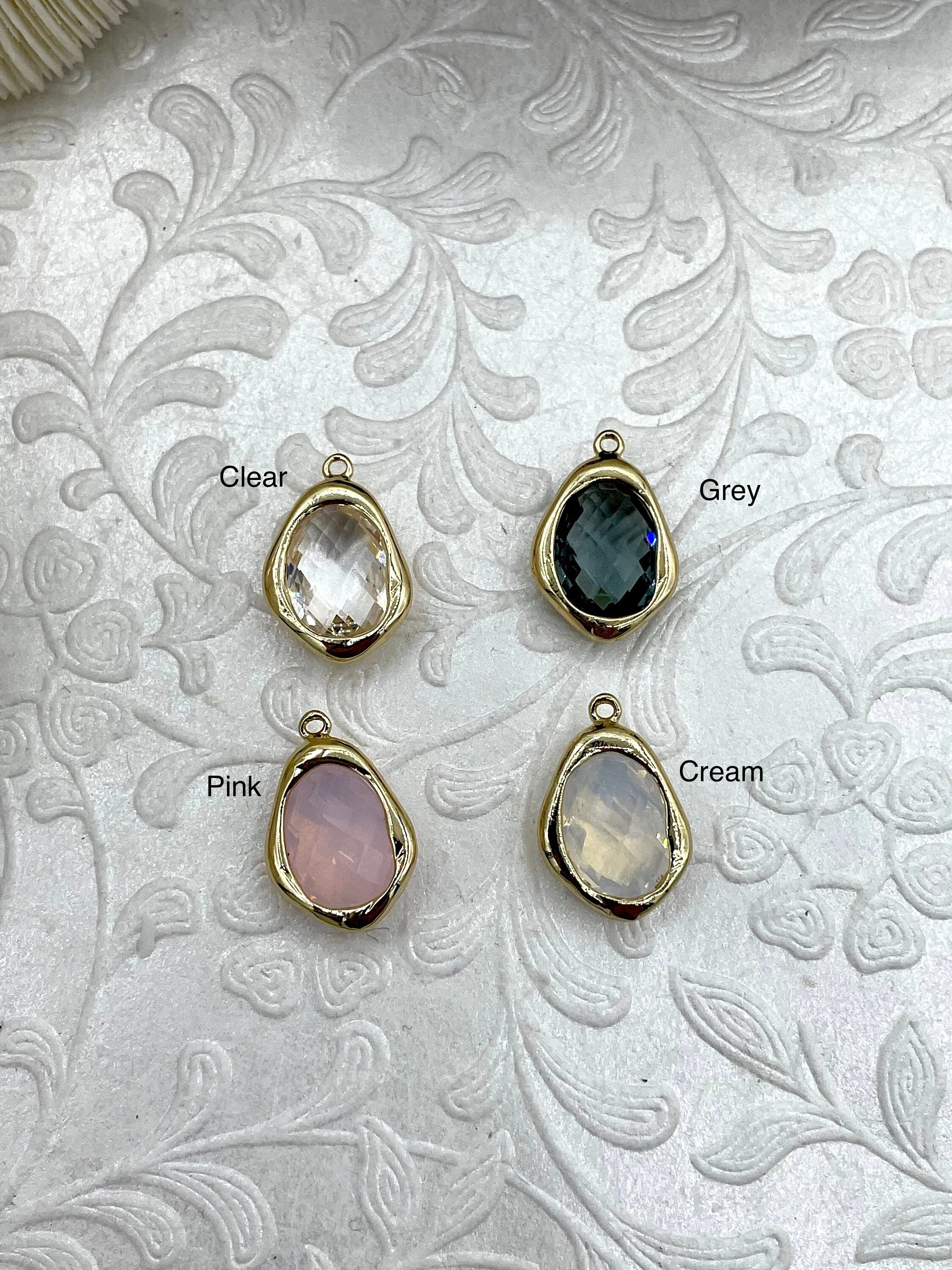 Gold Trimmed Crystal  Drop Pendants, Gold Trimmed Charms. Gold plated bezel, 4 styles, clear, grey, cream, and pink. Fast Ship