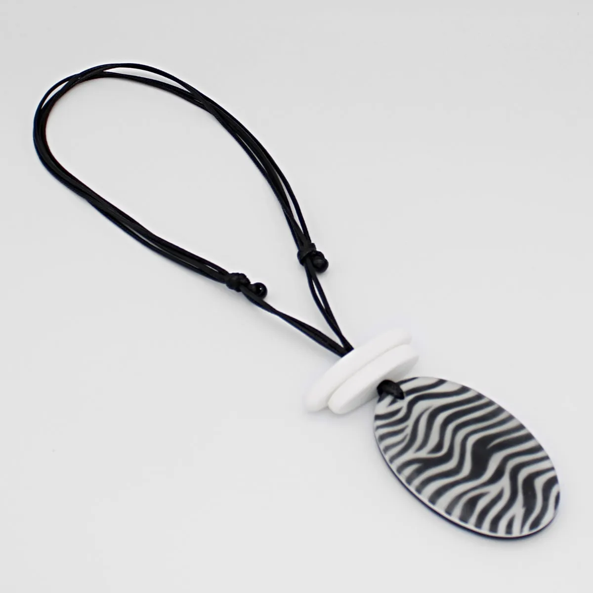 White Suky Zebra Pendant